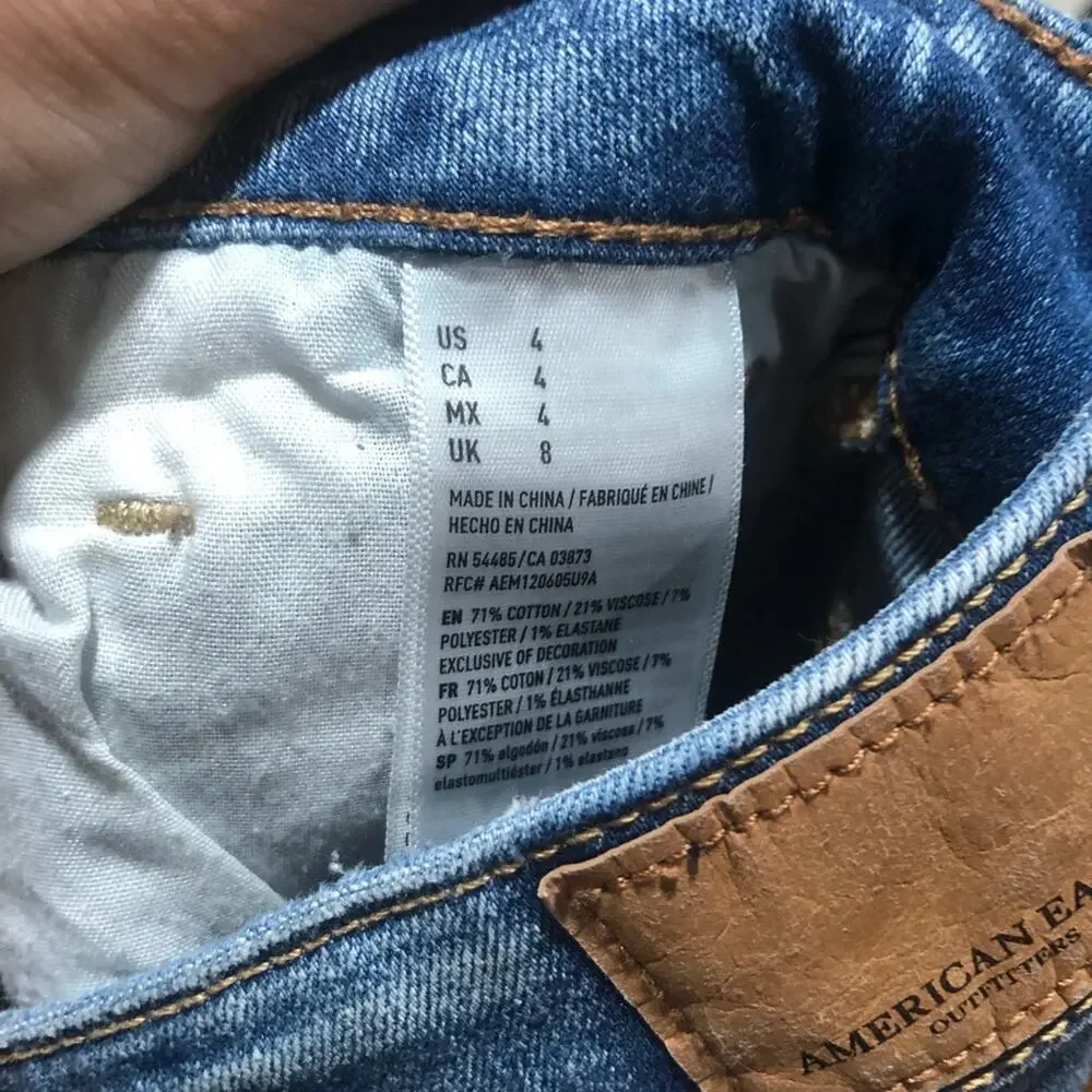 American Eagle Outfitters AEO distressed medium blue wash high rise mini skirt
